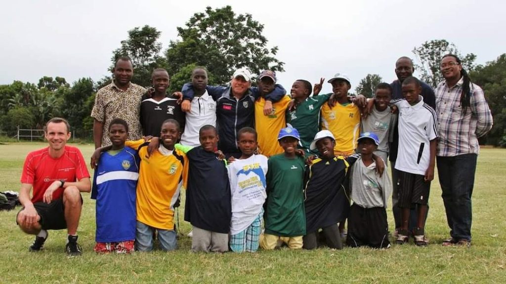 Dube with Mckinnon and Mason at Maningi Juniors